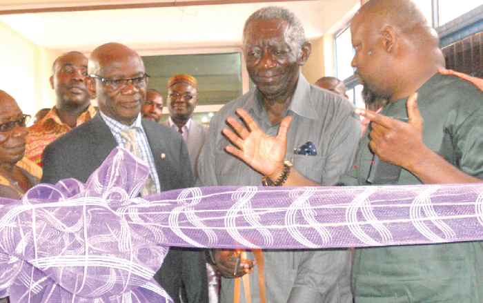  Fiifi Banson (right) in a chat with former President Kuffuor (middle) and other dignitaries during the inspection of the lecture halls. Picture: ESTHER ADJEI